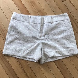 White and silver metallic shorts